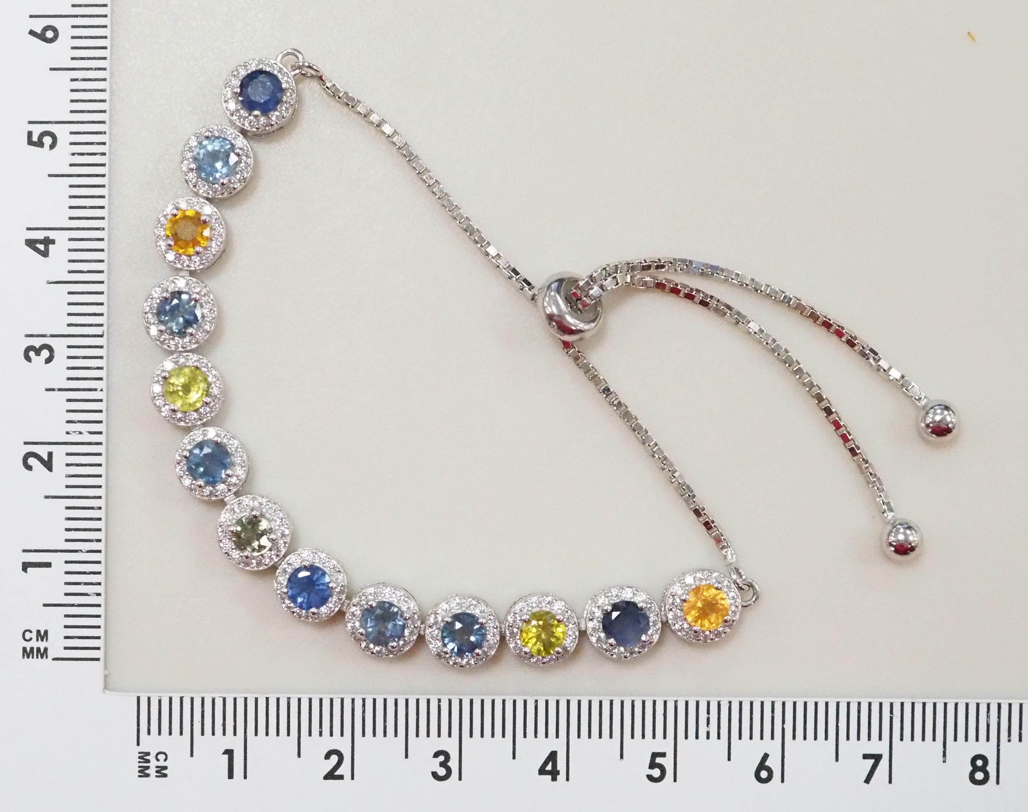 Серебряный браслет 925 пробы; вставки 13 Мультисапфир 5,41ct; Россыпь Куб.Цирконий бесцв. 1,45ct;